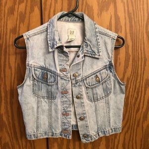Light blue sleeveless jean jacket